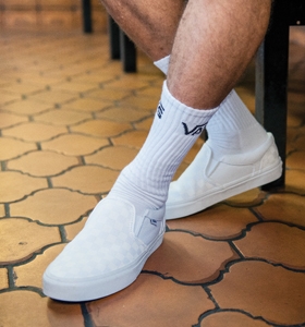 white slip on vans with socks